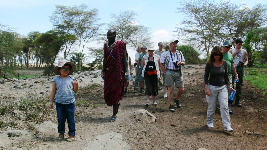 HWF team walking with local Maasai community members