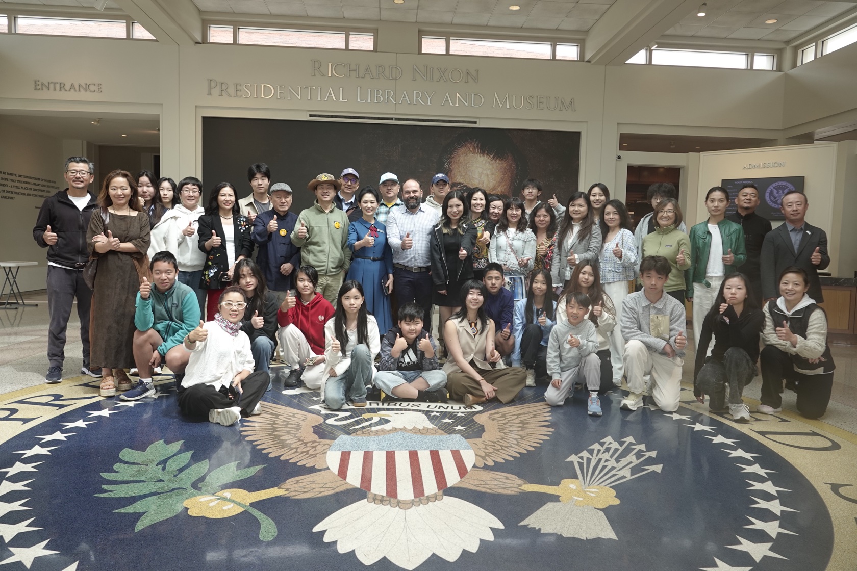 HWF family group portrait on the Presidential Seal at the Richard Nixon Presidential Library — LA Climate Week 2026