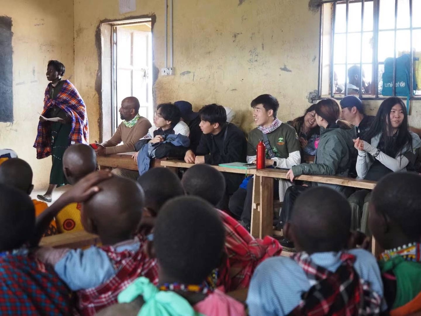 HWF mentors visiting a Maasai community classroom